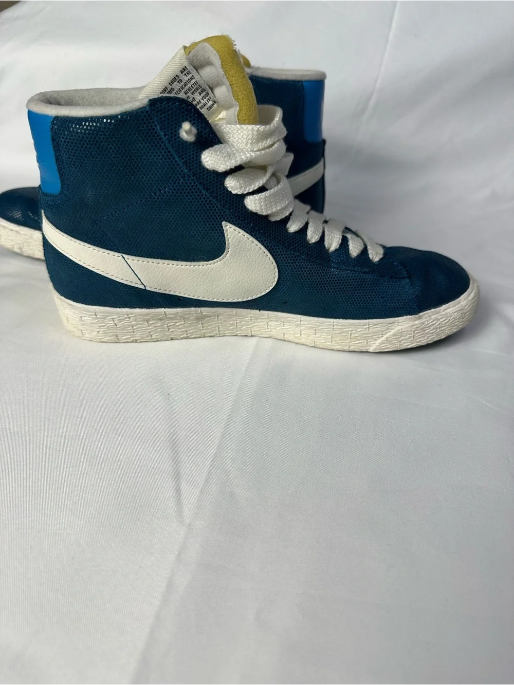 Nike Blue High-Top Sneakers with White Swoosh